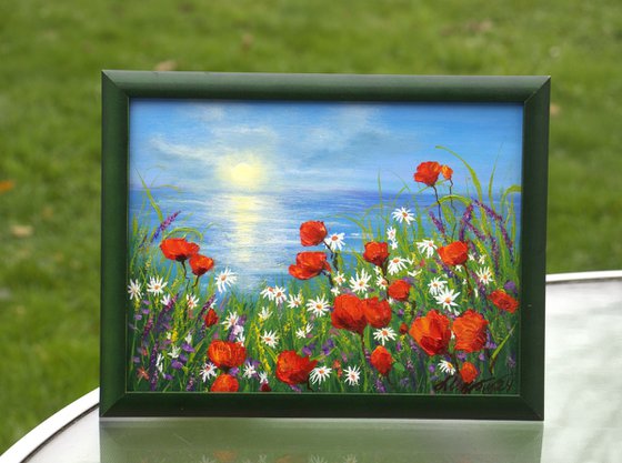 Seascape and poppy field