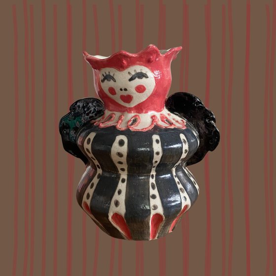 Harlequin curvy lady stoneware vase