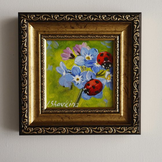 Ladybugs and Blue Flowers