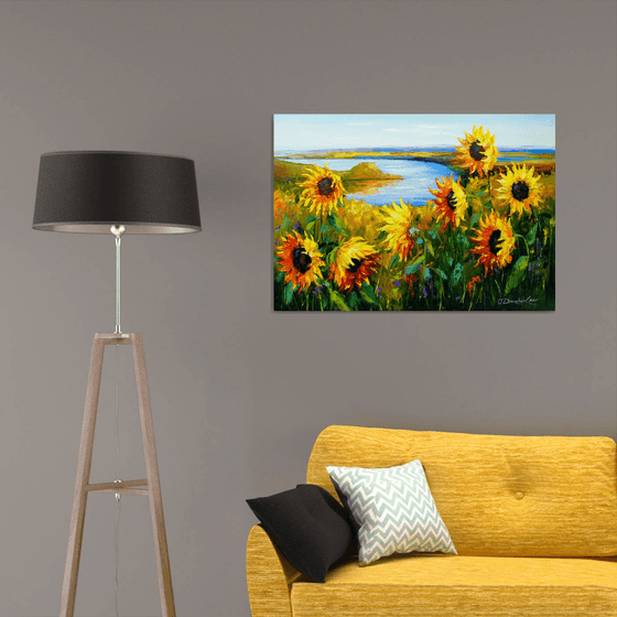 Sunflowers in the wind by the river