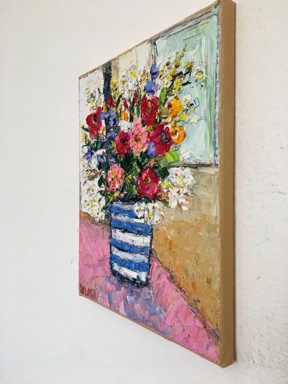 Striped vase with flowers