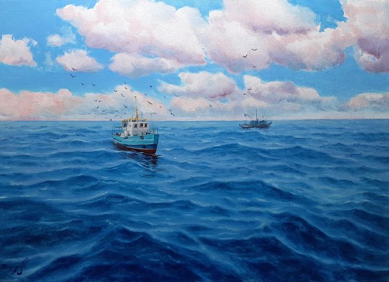 Fishing boats at sea