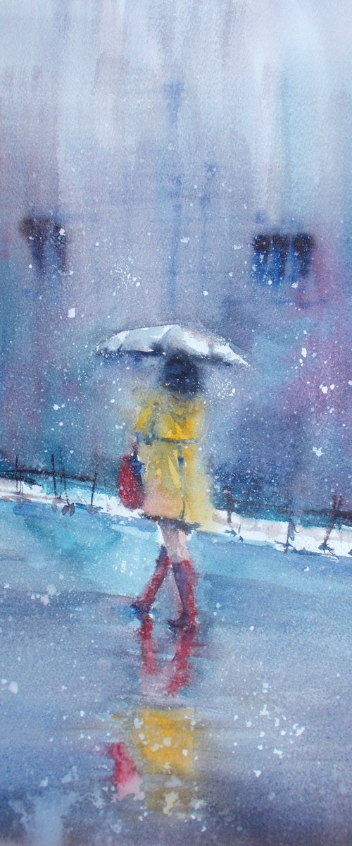 woman walking under the snow by Giorgio Gosti