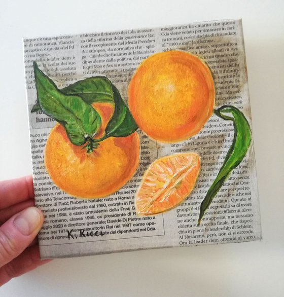 "Tangerines on Newspaper"