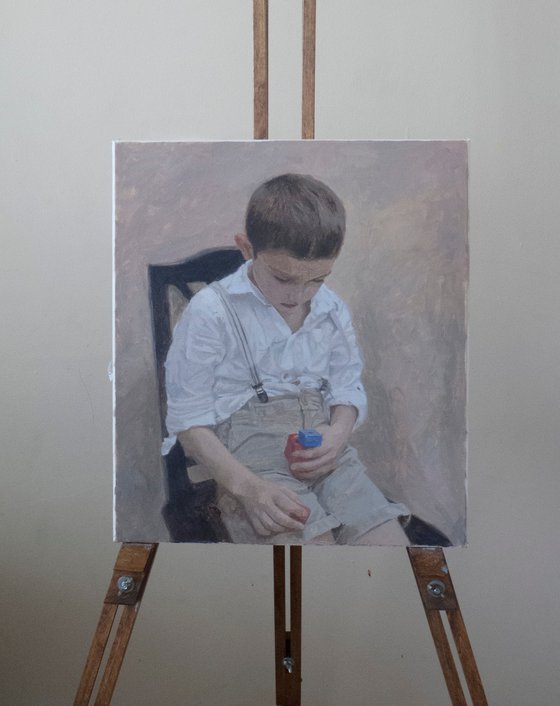 Boy with red and blue cubes