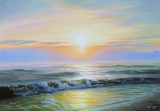 SUNRISE OVER THE SEA