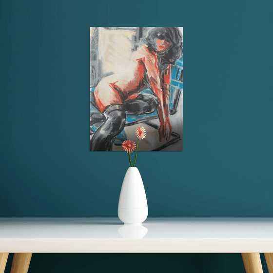 Nude on blue chair