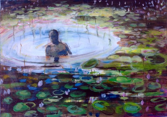 Man in lotus pond