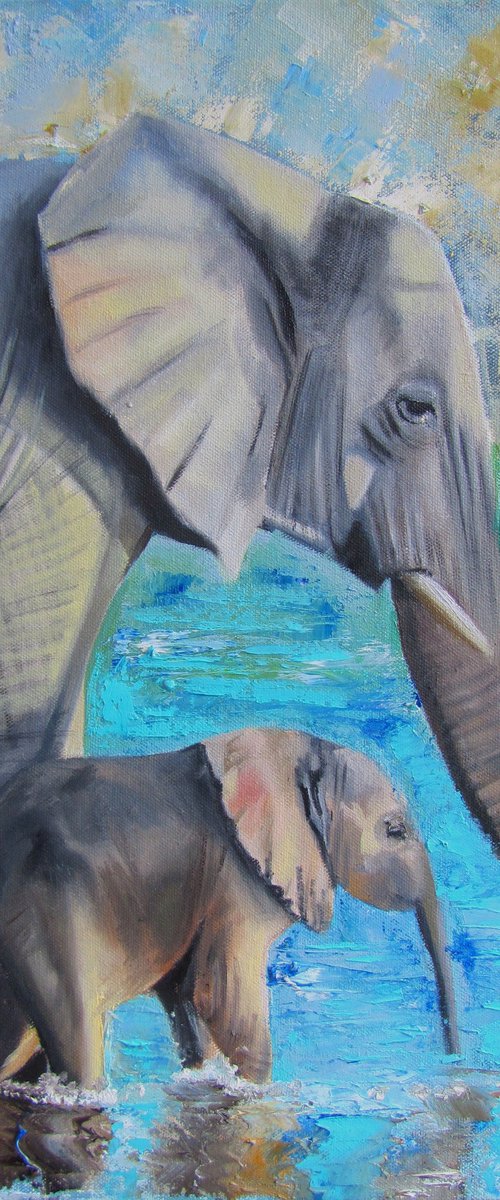 Elephant calf with his mother by Ira Whittaker