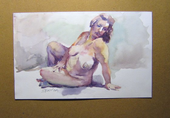 nude sitting on the floor