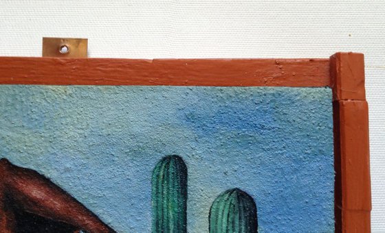 Introspective scene with saguaros.