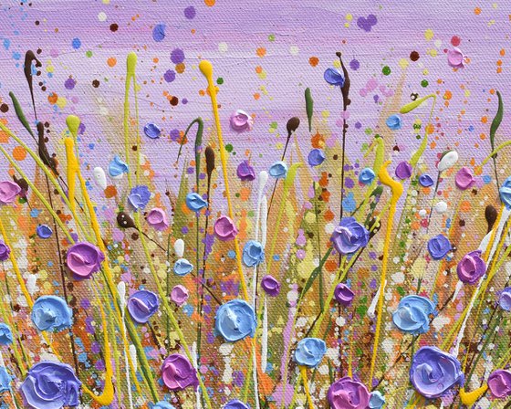 Purple sky over meadow