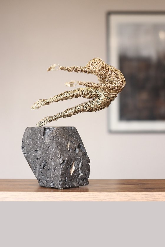 Storm (23x19x14cm 2.1kg brass, tufa)