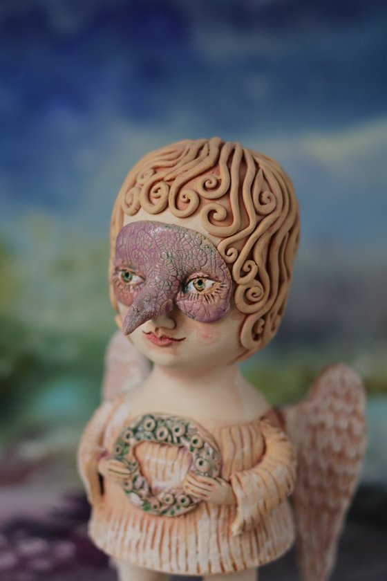 Angel with a mask. Ceramic OOAK sculpture.
