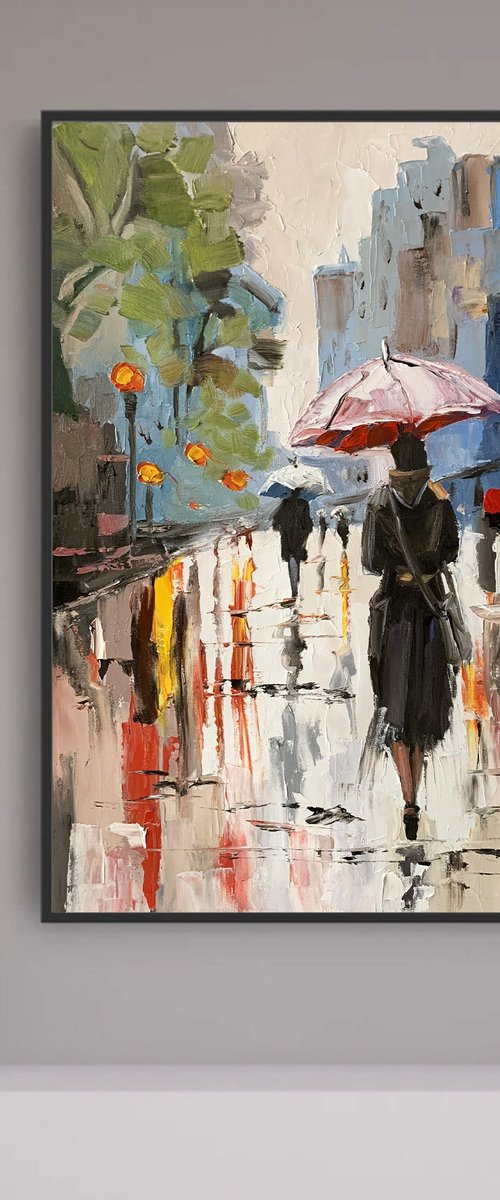 Woman with umbrella in a rainy city. by Vita Schagen