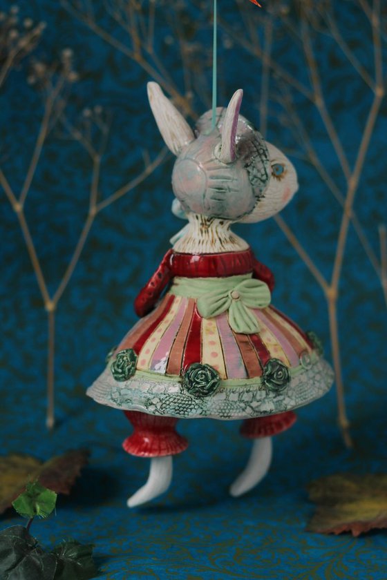 Rabbit mom, hanging sculpture, bell doll by Elya Yalonetski