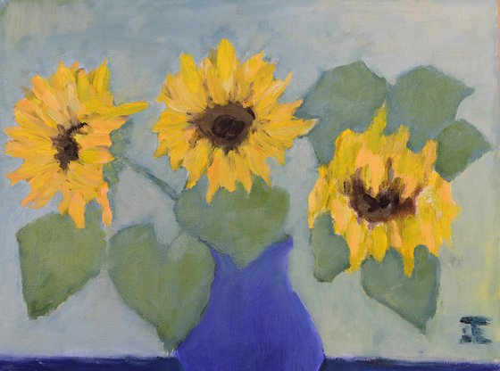 Sunflowers in blue vase