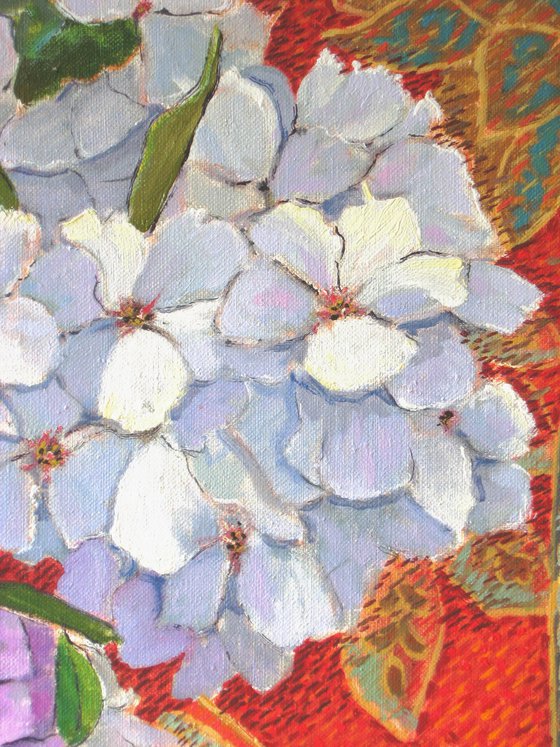 Blossom against Red Fabric