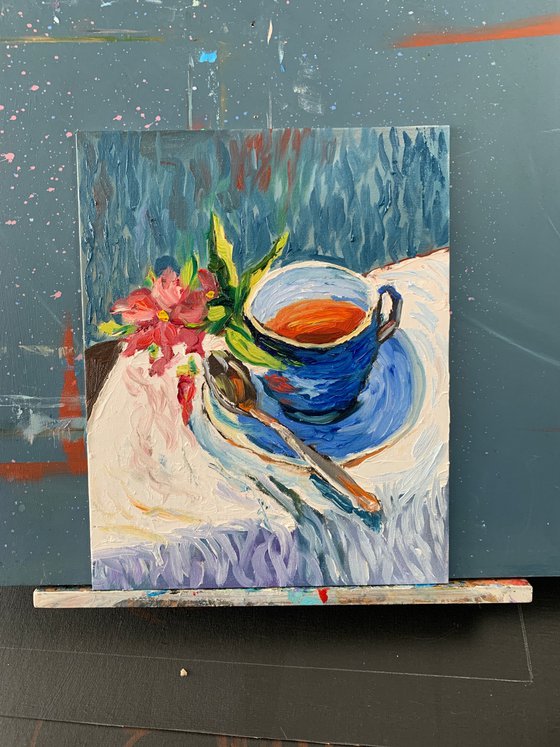 Tea cup with flowers.