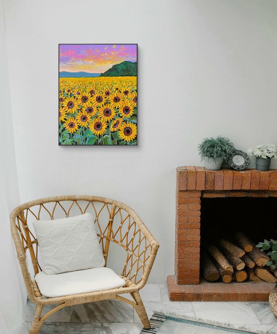 Sunflowers field at sunset