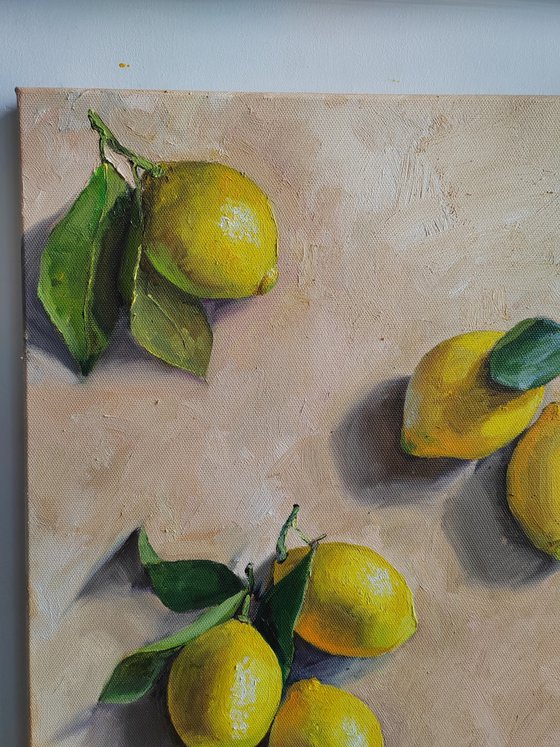 Lemon on cream background still life