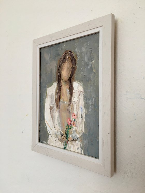 Girl with bouquet of flowers
