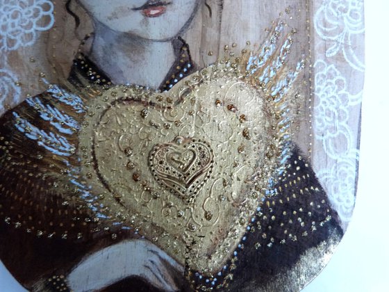 Portrait on wood, woman with a sacred heart. Sacred flight.