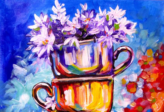 Cups with flowers
