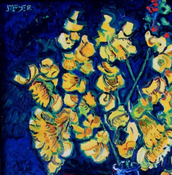 Daffodils in a blue glass