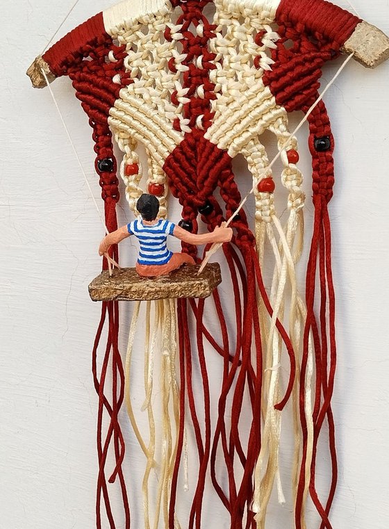 Boy and the macrame knots wall hanging