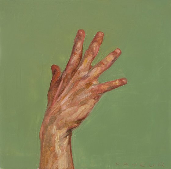 hand on a green background