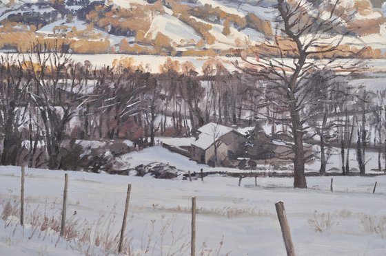 Snow on the Velay mountains, evening light