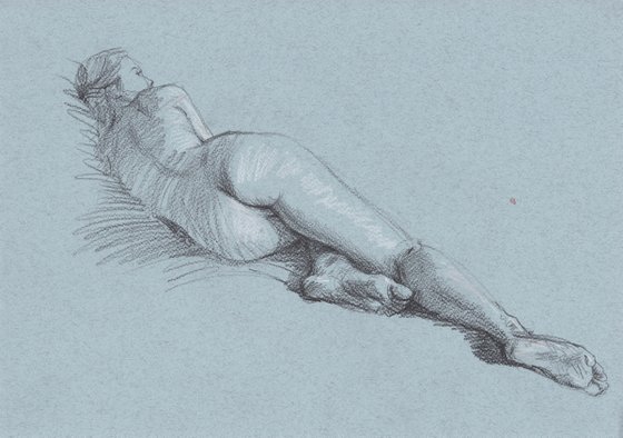 Sensitive erotic girl lying on the bed