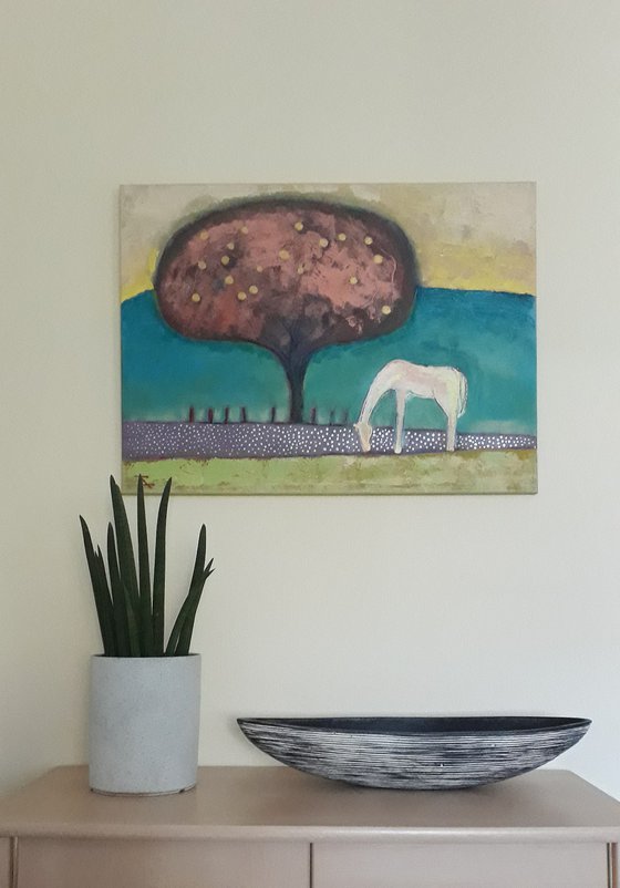 Landscape with a white horse.