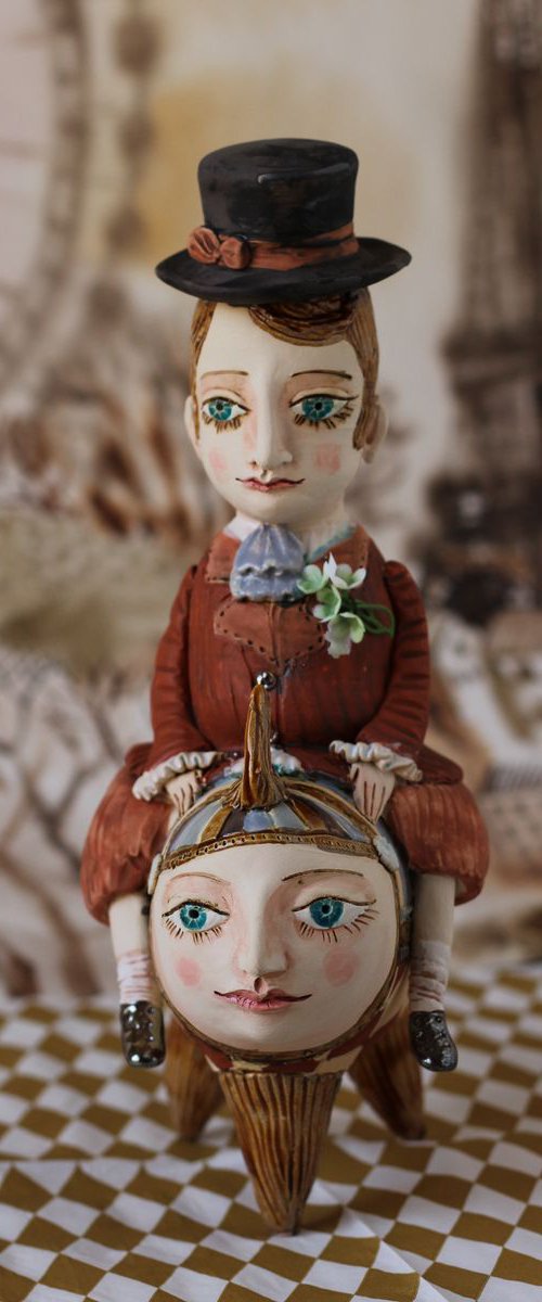 Vintage dressed boy riding the fish. From "Le Carousel, Hommage à l'Innocence" project by Elya Yalonetski by Elya Yalonetski