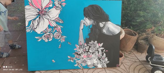 Brunette on blue with magnolias