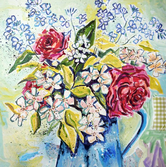 Summer flowers in a blue jug