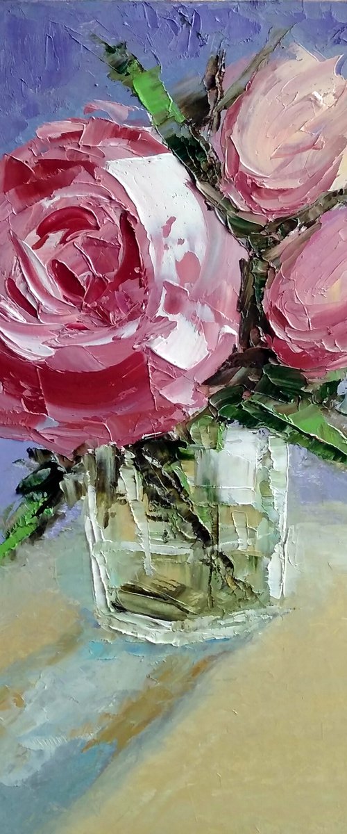 Pink roses in a glass by Yulia Berseneva