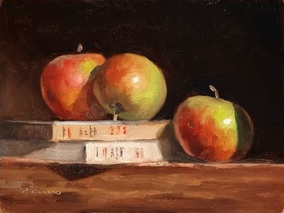 Apples and books from Saint-Exupéry.