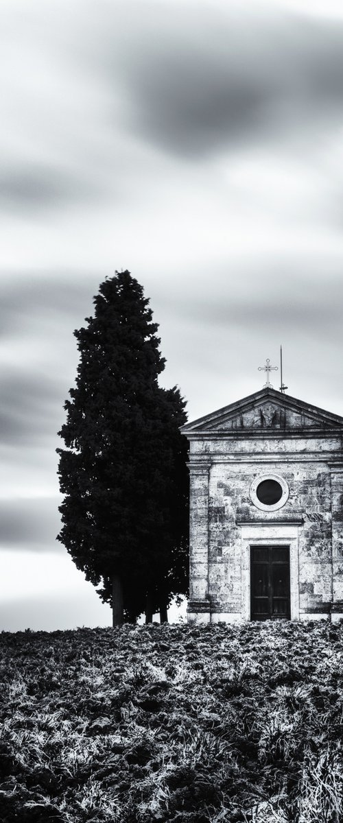 A small chapel with cypresses by Karim Carella