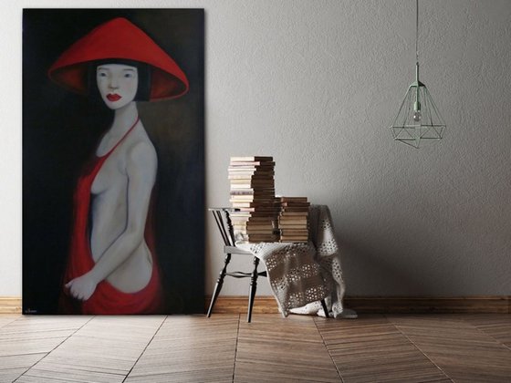 Oriental lady wearing a red hat and dress