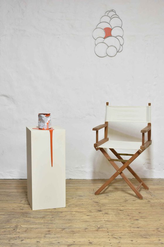 The old orange paint can