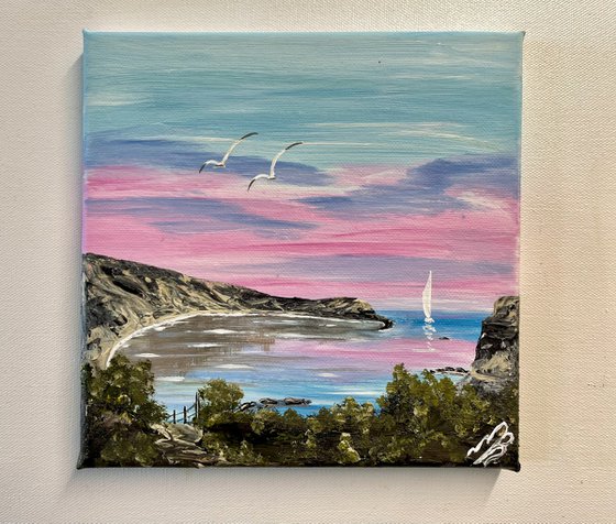 Lulworth Cove Under a Pink Sky