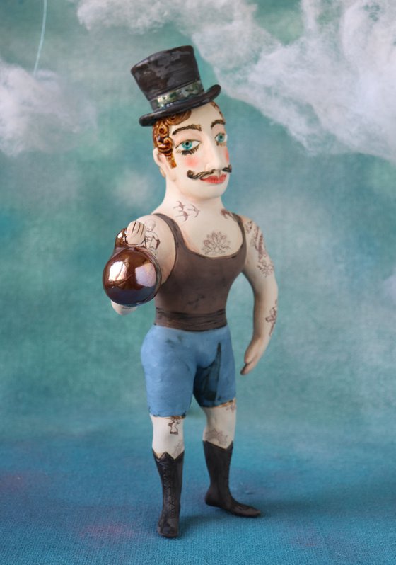 Vintage Strongman with zylinder hut. Wall sculpture by Elya Yalonetski.