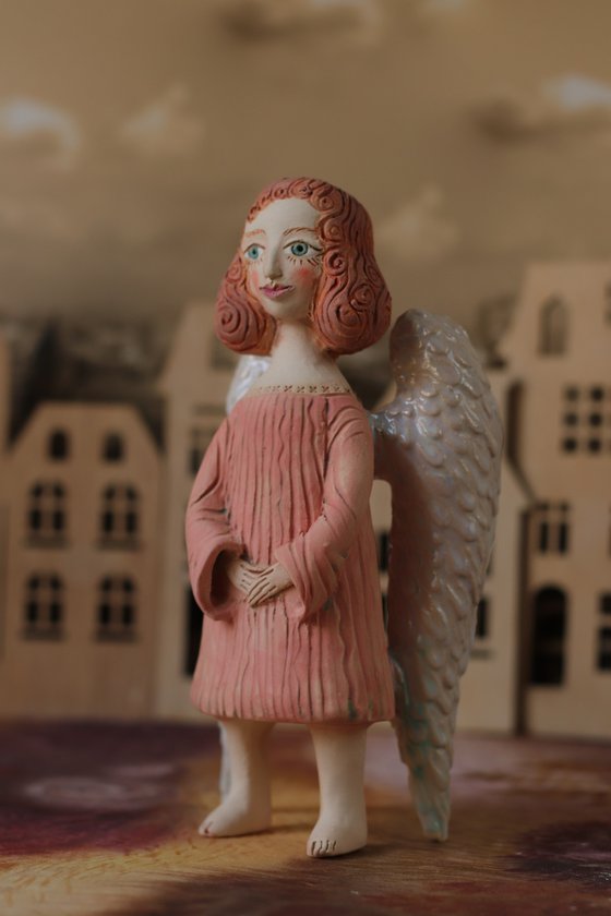 Angels all around me. Angel of hope. Ceramic sculpture