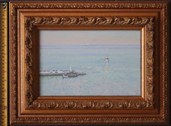 Sunset. The sea is calm. Bali. Crete. Greece