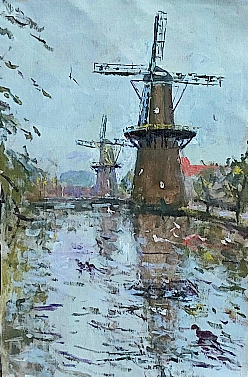 Dutch windmills by Dimitris Voyiazoglou