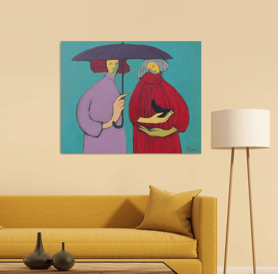 Two under an umbrella.