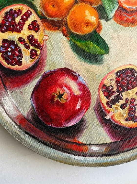 Pomegranates and tangerines