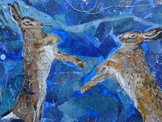 Hares dancing in the light of the moon